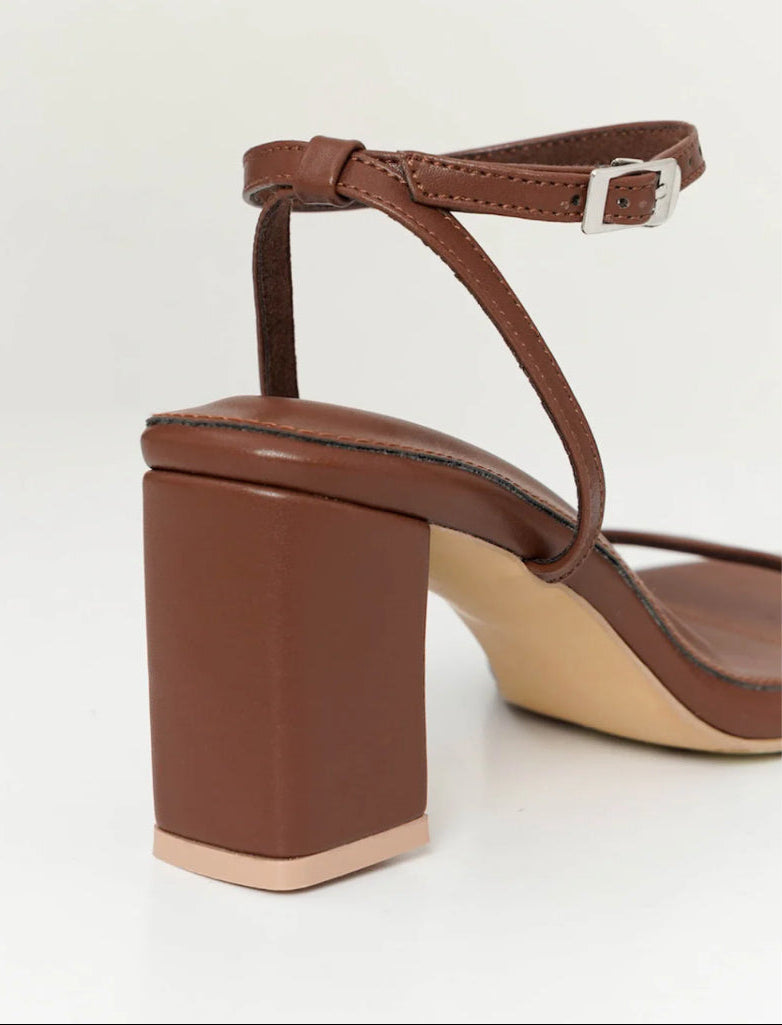 dark Brown sandal with block heel on a light gray background
